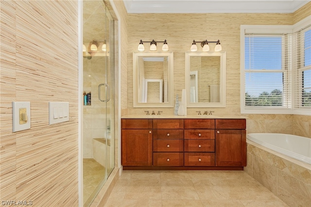 bathroom with tile flooring, large vanity, independent shower and bath, and dual sinks