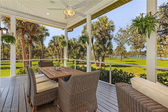 sunroom / solarium with ceiling fan