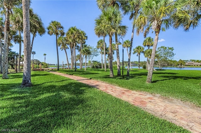 view of nearby features featuring a water view and a yard