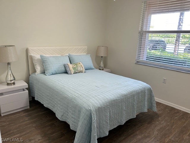 bedroom featuring dark hardwood / wood-style floors