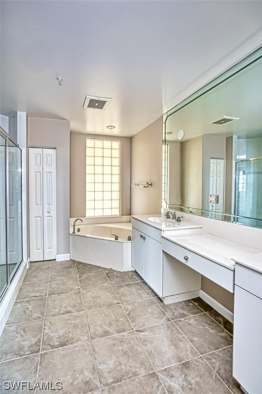 bathroom with separate shower and tub and vanity