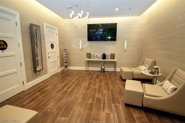 interior space with a chandelier and ornamental molding