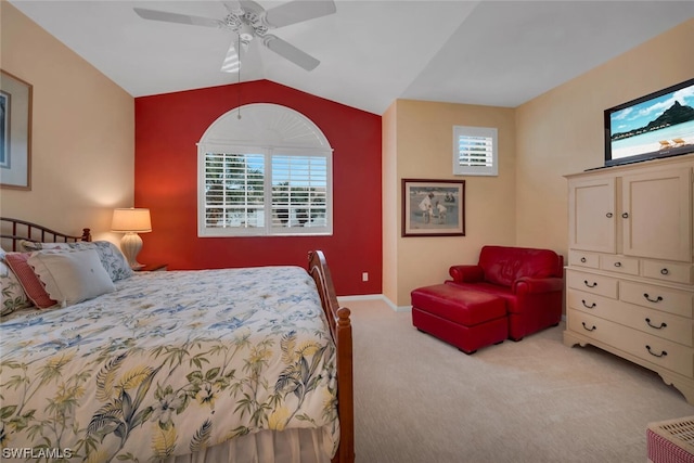 bedroom with light carpet, vaulted ceiling, and ceiling fan