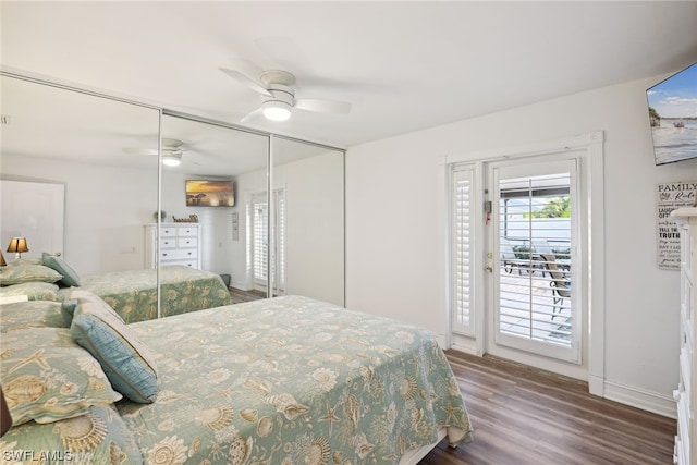 bedroom with hardwood / wood-style floors, ceiling fan, a closet, and access to exterior