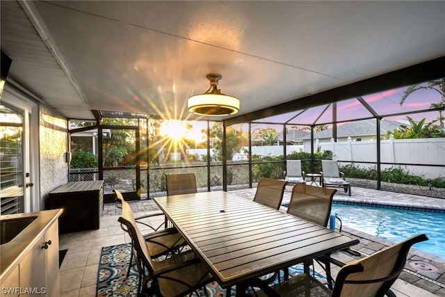 sunroom / solarium featuring a pool