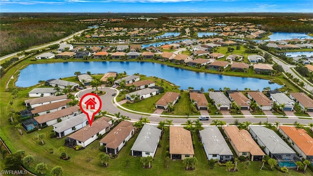 birds eye view of property featuring a water view