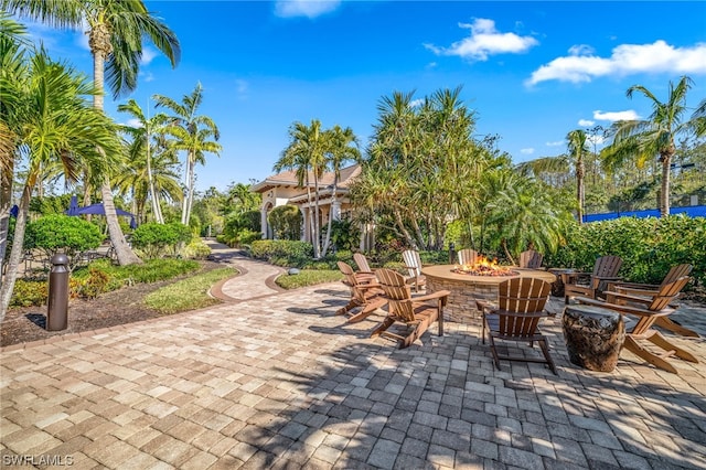 view of patio featuring an outdoor fire pit