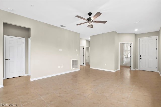 unfurnished room featuring ceiling fan and light tile patterned flooring