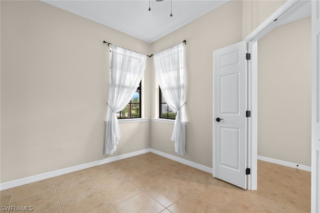 view of tiled spare room