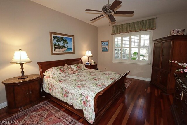 bedroom featuring dark hardwood / wood-style floors and ceiling fan