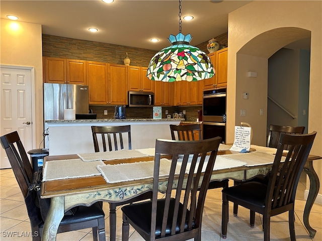 dining room featuring light tile patterned floors