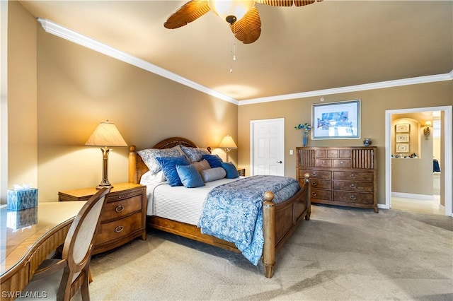 bedroom with light carpet, crown molding, and ceiling fan