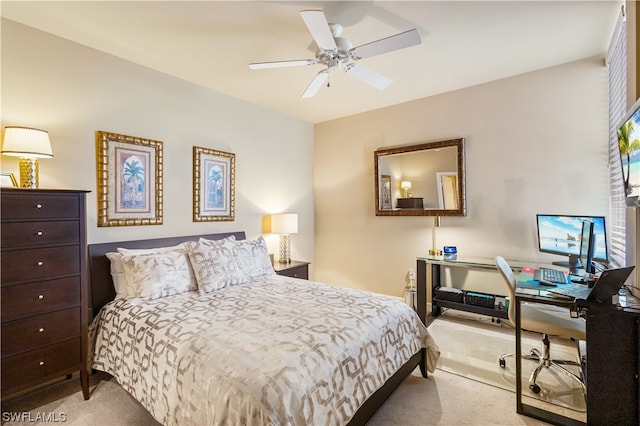 bedroom with light carpet and ceiling fan