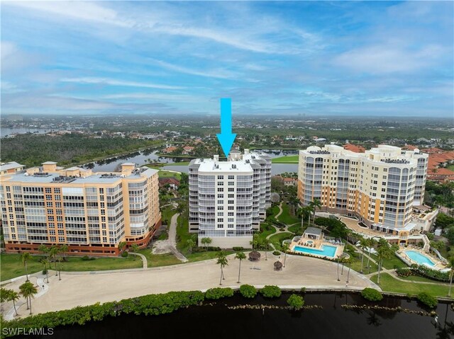 birds eye view of property featuring a water view