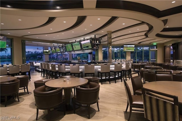 dining space featuring recessed lighting