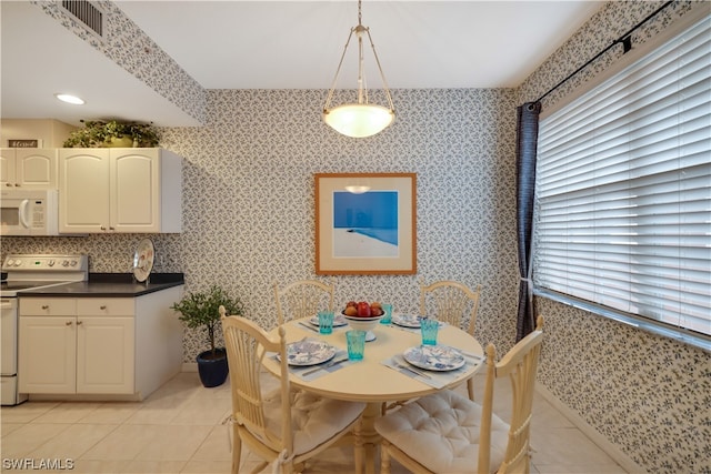 view of tiled dining area