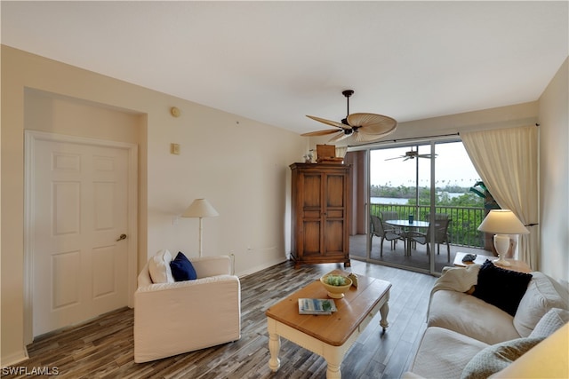 living room with hardwood / wood-style floors and ceiling fan