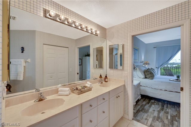 bathroom featuring vanity and wood-type flooring