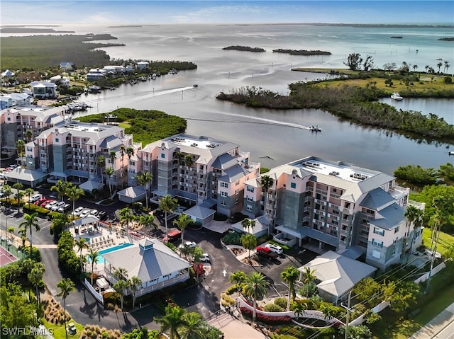 birds eye view of property featuring a water view