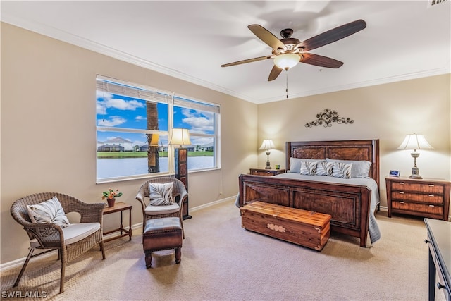 bedroom featuring a water view, ornamental molding, light colored carpet, and ceiling fan