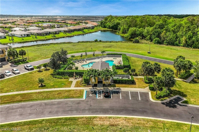 drone / aerial view with a water view