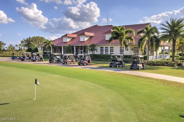 view of home's community featuring a lawn