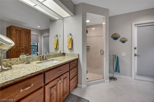 bathroom featuring vanity and walk in shower