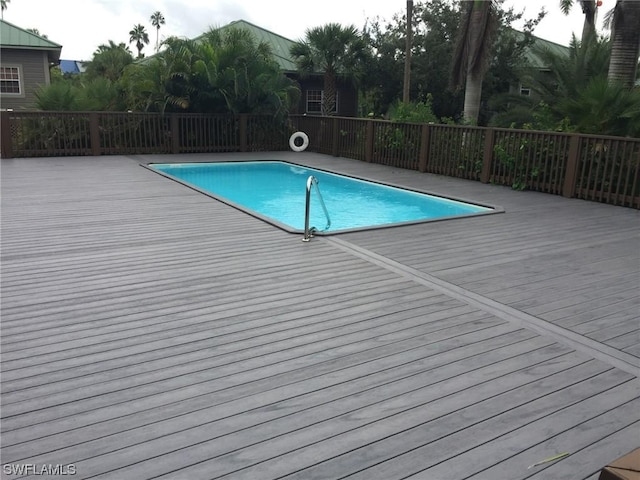 view of pool with a deck