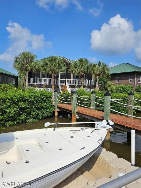 dock area featuring a water view