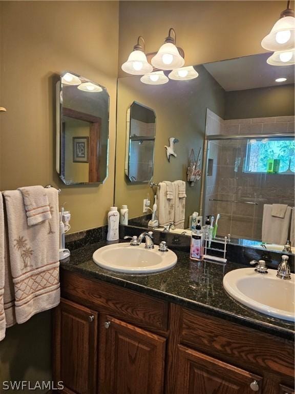 bathroom with vanity and an enclosed shower