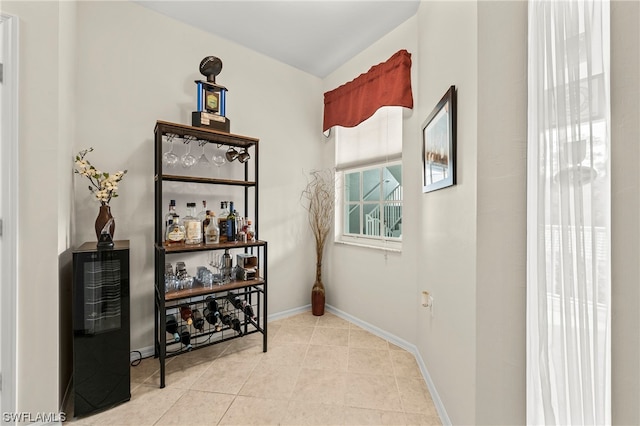 hallway with light tile floors