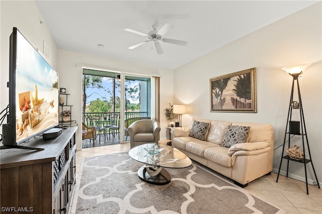 tiled living room featuring ceiling fan