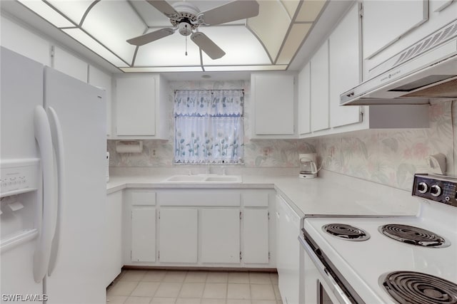 kitchen with white appliances, white cabinetry, ceiling fan, and light tile flooring