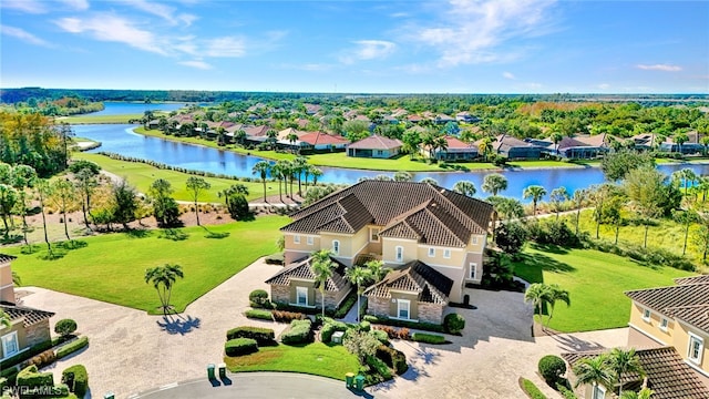 drone / aerial view with a water view