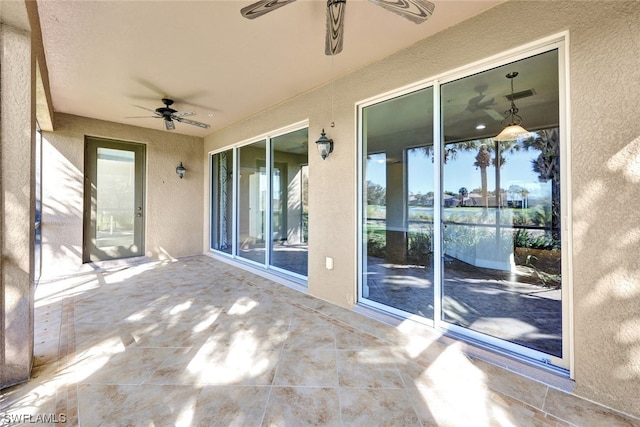 view of patio / terrace with ceiling fan