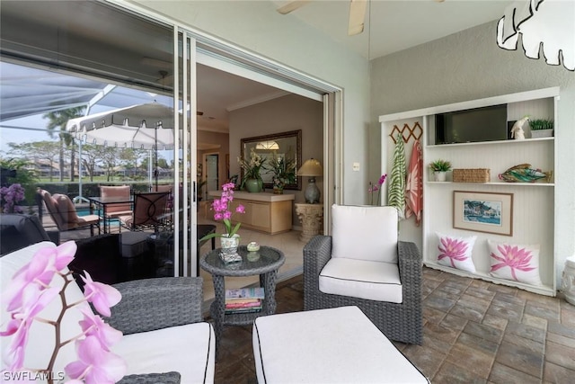 view of patio featuring ceiling fan and an outdoor hangout area