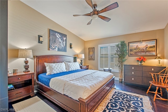 bedroom with ceiling fan and dark wood-type flooring