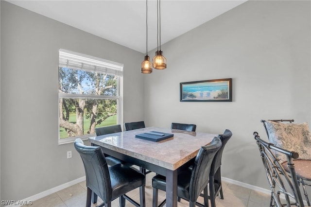 dining area featuring light tile patterned floors