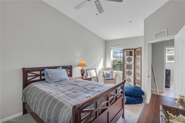 bedroom featuring ceiling fan and light colored carpet