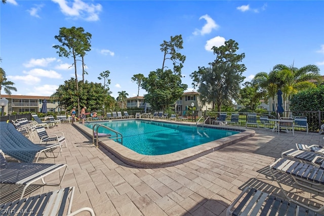 view of pool featuring a patio area