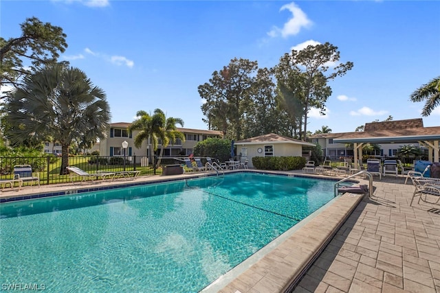 view of pool featuring a patio area