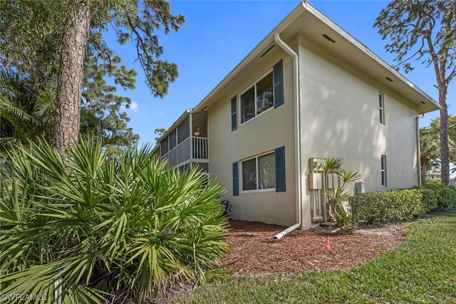 view of property exterior featuring a balcony