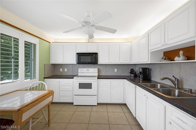 kitchen featuring white appliances, ceiling fan, tasteful backsplash, sink, and light tile floors