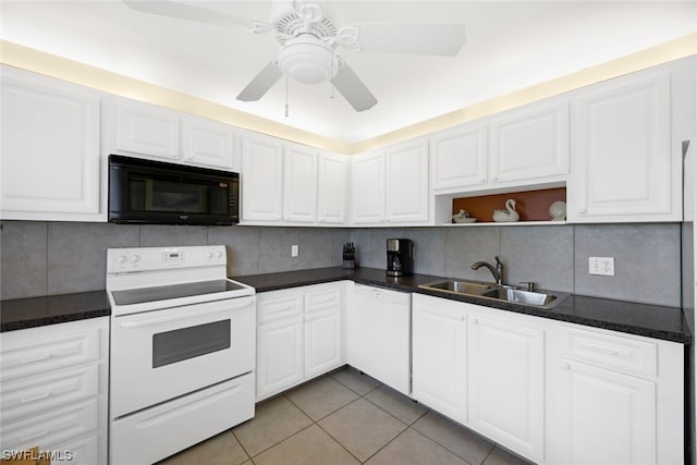 kitchen featuring backsplash, ceiling fan, white appliances, and sink