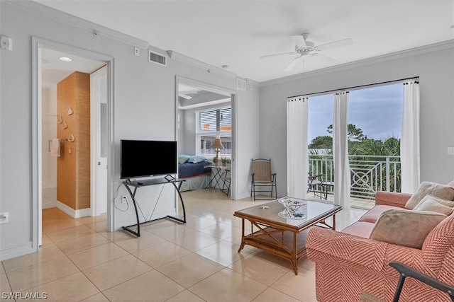 tiled living room featuring ornamental molding and ceiling fan