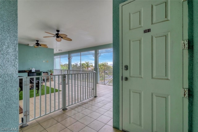 interior space featuring ceiling fan