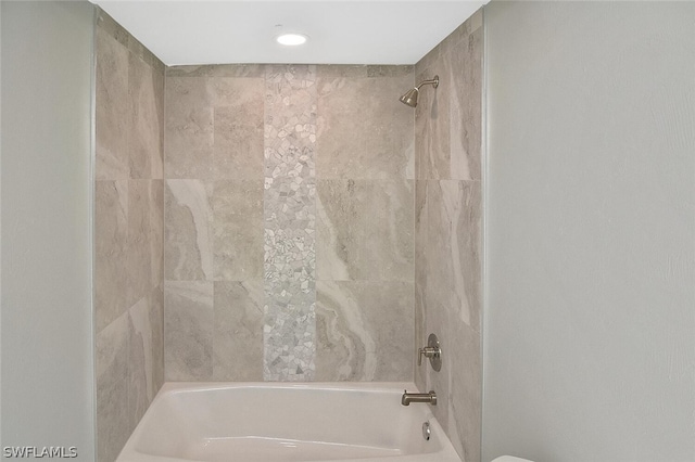 bathroom featuring bathtub / shower combination