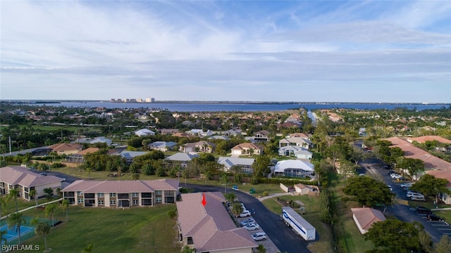 drone / aerial view featuring a water view