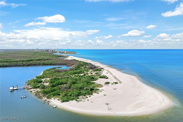 bird's eye view with a beach view and a water view