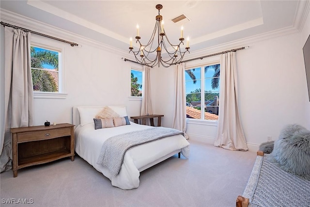 bedroom with visible vents, an inviting chandelier, crown molding, light carpet, and a raised ceiling